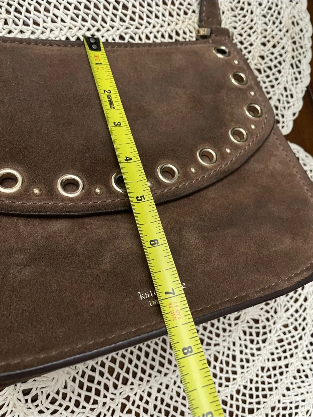 kate spade brown suede eyelet saddle crossbody